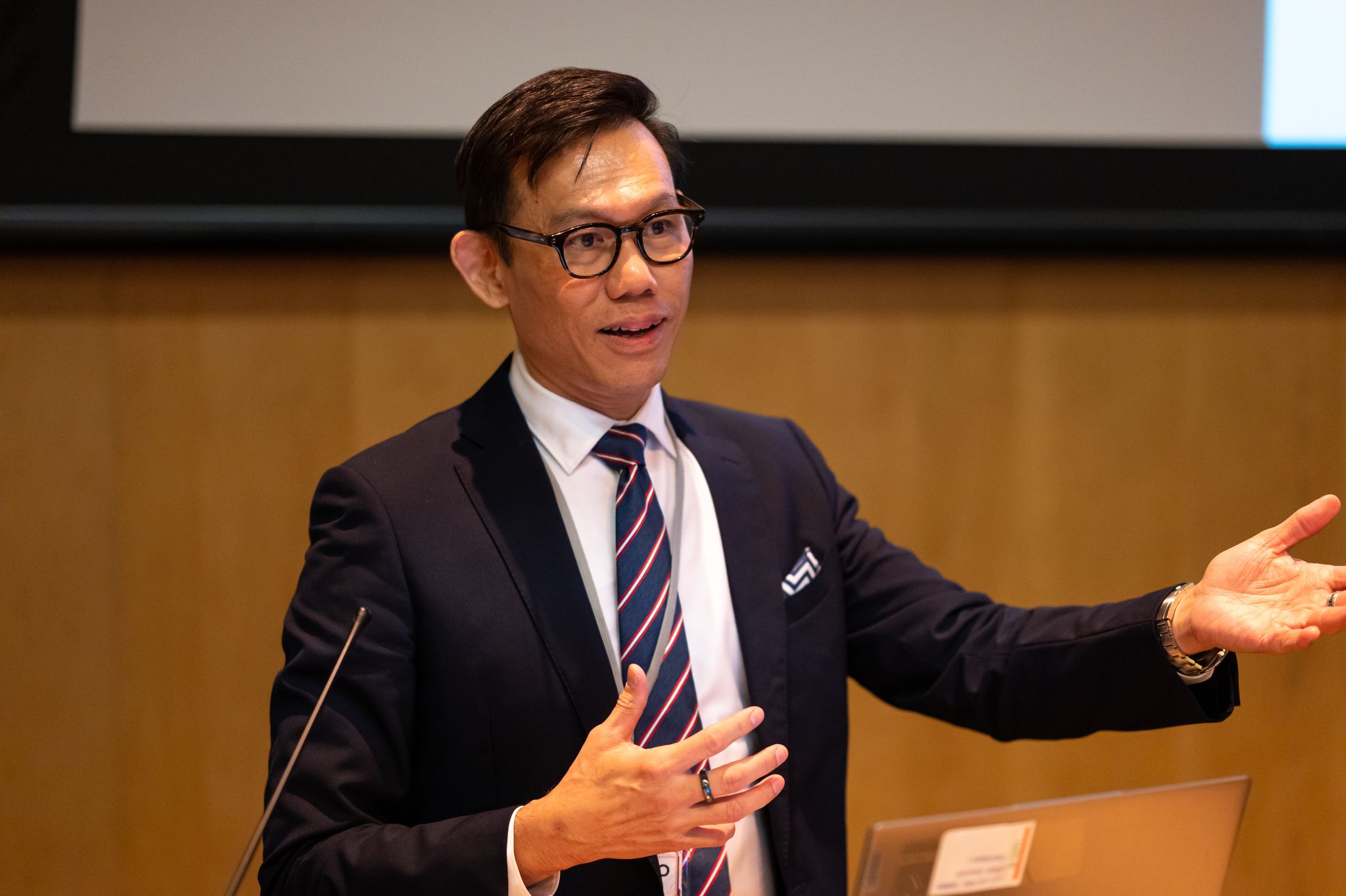 Dr. Alan Go — speaking at conference